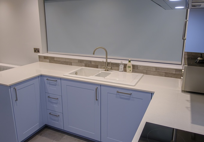 traditional shaker kitchen in Milford-on-sea with white quartz worktops
